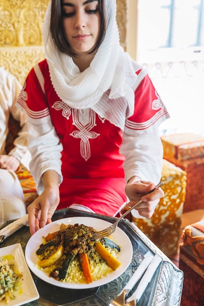 Arab Dish and Woman in Restaurant – Free Stock Photo for Download