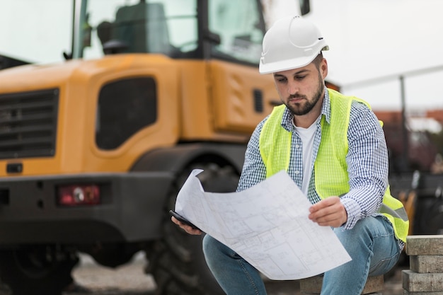 Man Sitting and Looking at Project – Free Stock Photo, Download for Free