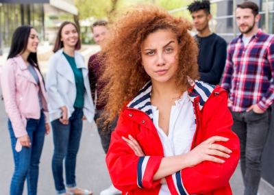 Beautiful Woman with Curly Hair Looking at Camera – Free Download