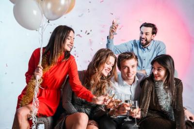 Friends Celebrating at a New Year Party – Free Stock Photo for Download