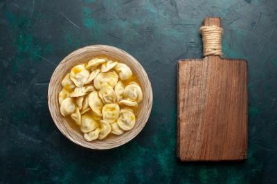 Delicious Dumpling Soup on Dark Green Background – Free Stock Photo for Download