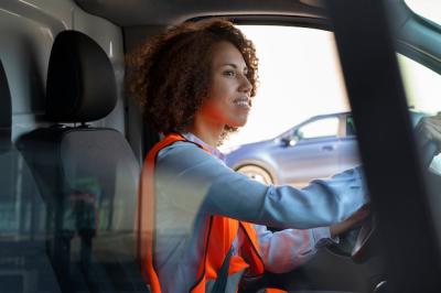 Professional Female Driver at Work – Free Download