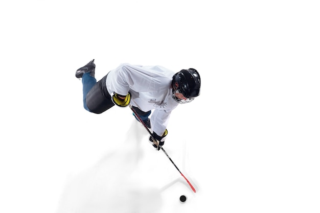 Unrecognizable Male Hockey Player on Ice Court | Free Download