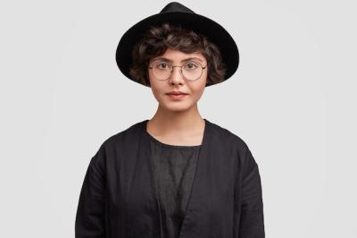 Young Woman in All Black Clothing and Round Eyeglasses – Free Stock Photo for Download