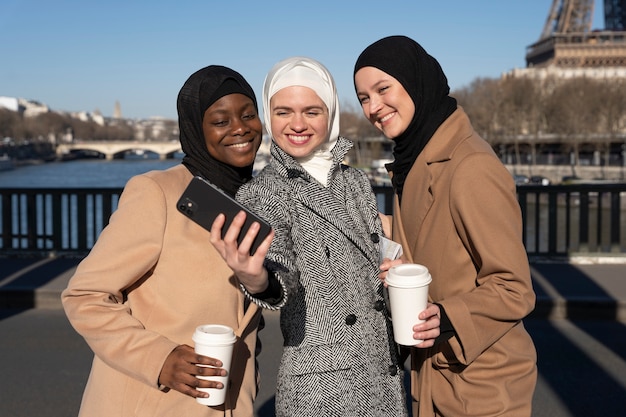 Muslim Women Traveling in Paris Together – Free Stock Photo for Download