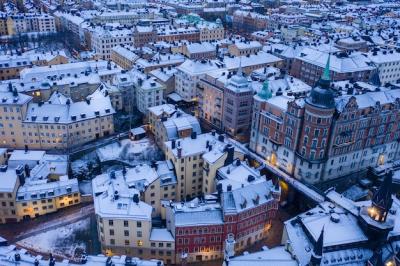 Snowy Cityscape at Dawn – Free Download
