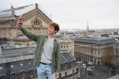 Medium Shot of a Guy Taking a Selfie – Free Stock Photo for Download