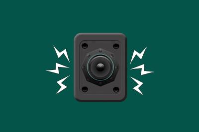 High Volume Speakers on a Green Background – Free Download