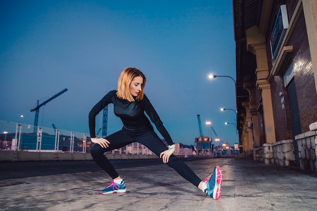 Leg Exercise by Woman on Street – Free Stock Photo, Download Free