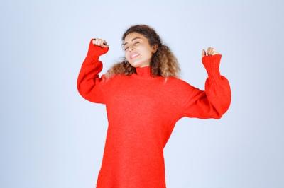 Woman in Red Sweatshirt Looks Tired and Sleepy – Free Stock Photo for Download