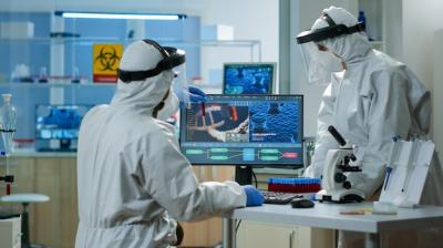 Scientists Analyzing Blood Samples in High-Tech Laboratories – Free Download