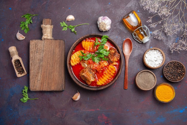 Delicious Meat Sauce Soup with Seasonings on Black Background – Free Download