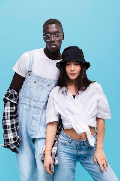 Fashionable Couple Posing in Studio – Free Stock Photos for Download