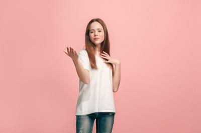 Happy Teen Girl Smiling in Trendy Pink Studio – Free Stock Photo for Download