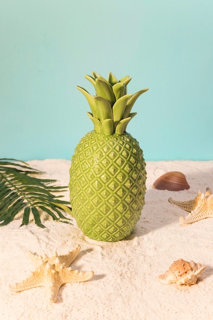 Toy Pineapple on Beach – Free Download