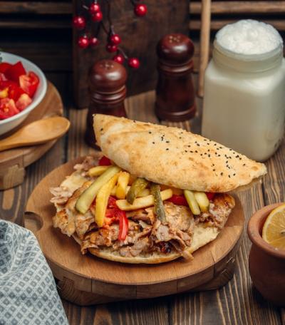 Delicious Hamburger with Kebab Meat, Tomato, and Cucumber – Free Download