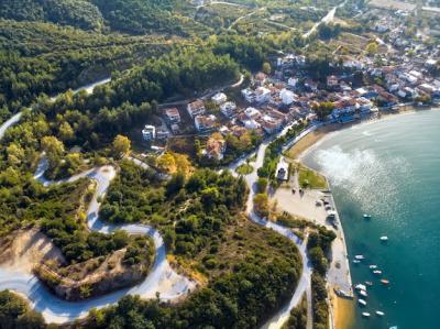 Aerial Drone View of Blue Sea and Windy Mountain Roads in Halkidiki, Greece – Free to Download
