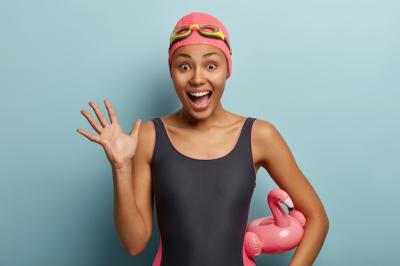 Happy Female Swimmer Celebrating Joyfully – Free Stock Photo