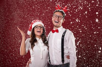 Happy Nerd Couple Surrounded by Snowflakes – Free Stock Photo Download