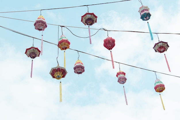 Lanterns Hanging Against a Cloudy Sky – Free Stock Photo for Download