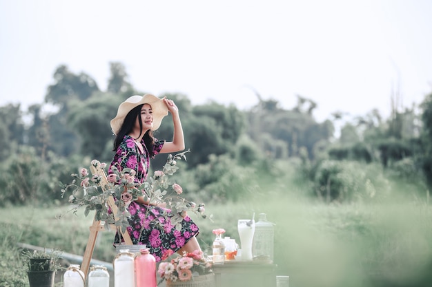 Girl in a Floral Dress Surrounded by Nature – Free Download