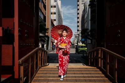 Woman Using Wagasa Umbrella – Free Stock Photo for Download