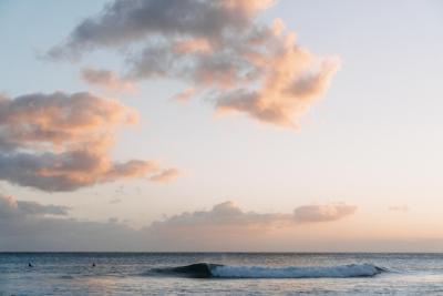 Stunning Sunset Over Ocean with White Clouds | Free Download