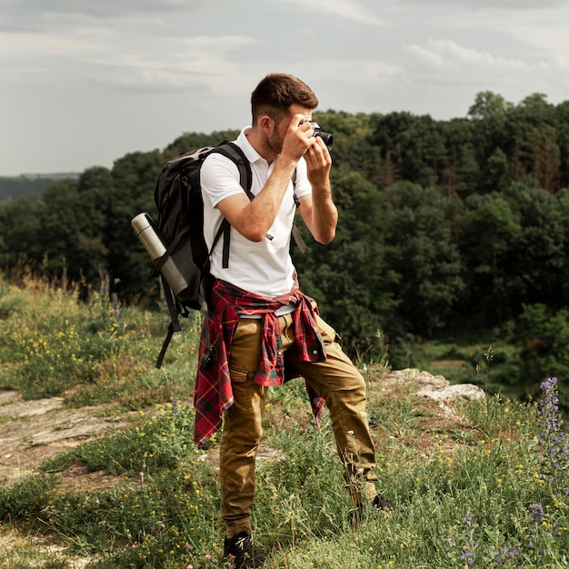 Traveler Capturing Moments – Free Stock Photo for Download
