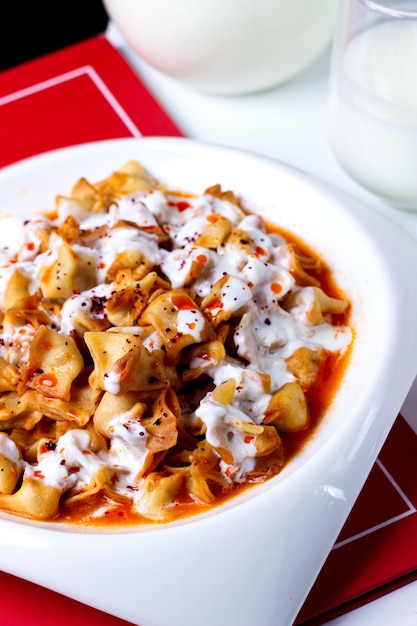 Pasta in Sauce Topped with Sour Cream – Free to Download