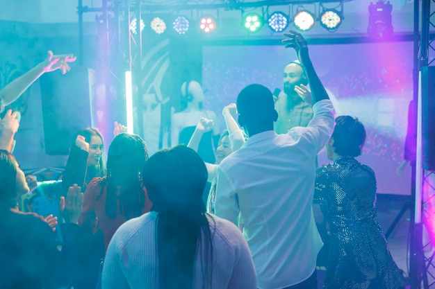 People Jumping and Raising Hands in Club – Free Stock Photo, Download Free Stock Photo