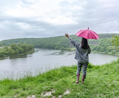 Back View of a Girl Under an Umbrella in a Rainy Forest by the Lake – Free Stock Photo, Download for Free