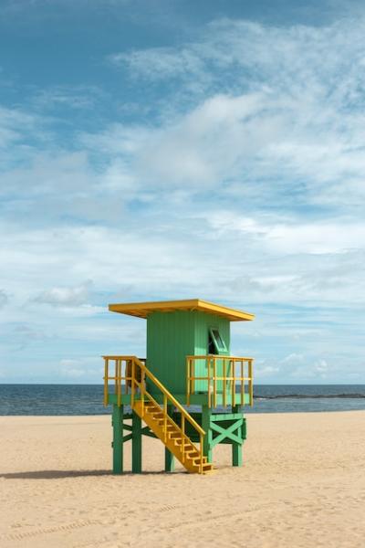 Green Lifeguard Tower on Beach – Free Download