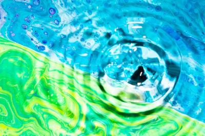 Close-up Water Rings on Green and Blue Background – Free Download