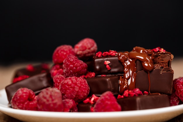 Chocolate Candies and Raspberries on White Plate – Free Stock Photo, Download for Free