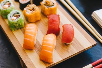 Stunning Aerial View of Sushi on a Wooden Board – Free Download