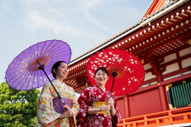 Smiley Women Holding Wagasa Umbrella – Free Download