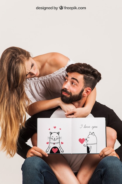 Young Couple Holding Open Book – Free Stock Photo, Download Free