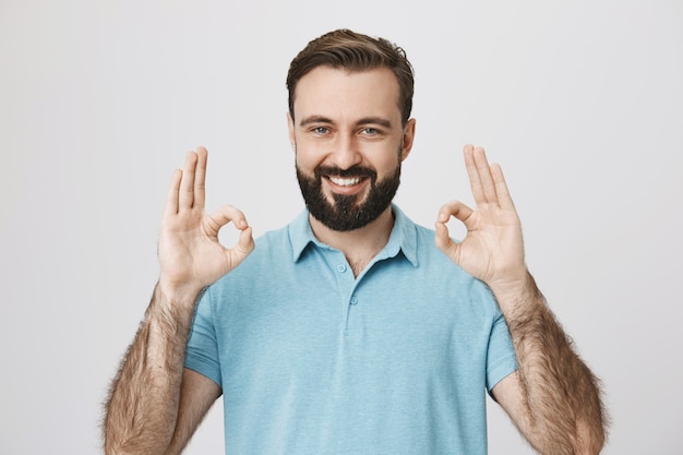 Pleased Male Customer Showing Okay Sign – Free Stock Photo, Download Free