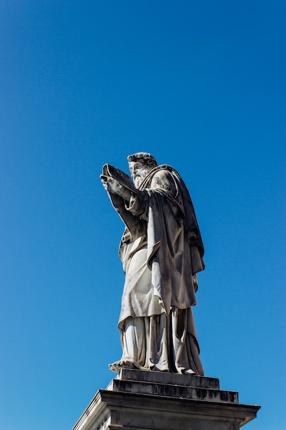 Ancient Historic Statue Reaching for the Clear Blue Sky – Free Download