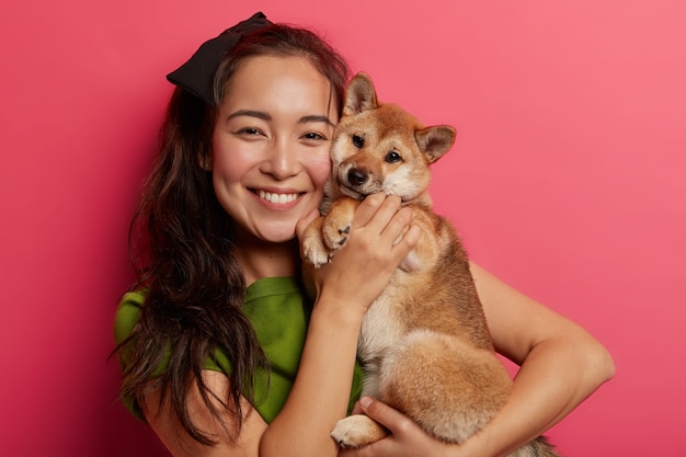 Adorable Young Girl Smiling with Shiba Inu Dog – Free Stock Photo, Download for Free