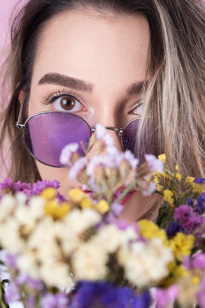 Close-Up of a Woman with Flowers – Free Download