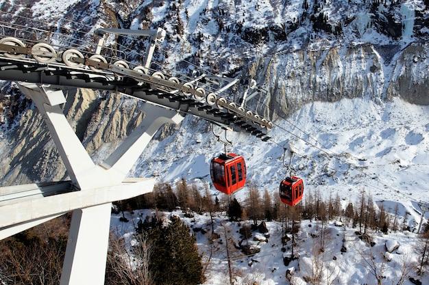 Red Gondolas in Alpine Mountains During Winter – Free to Download