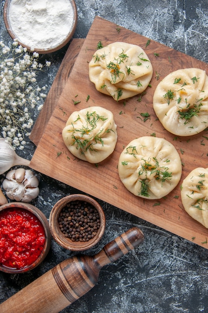 Raw Dumplings with Meat and Tomato Sauce – Free Stock Photo for Download