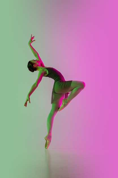 Graceful Ballet Dancer in Neon Colors: Flexibility and Motion Concept – Free Download