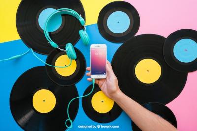 Vinyl Mockup Featuring Hand Holding Smartphone – Free Download