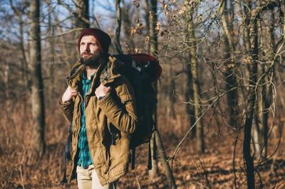 Young Hipster Man in Autumn Forest: Active Tourist in Warm Jacket and Hat – Free Download