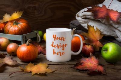 White Coffee Mug Mockup Surrounded by Fall Leaves and Pumpkins – Free Download