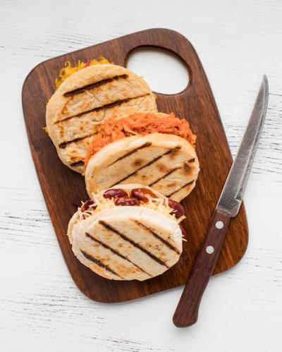 Traditional Arepas on Wooden Board – Free to Download