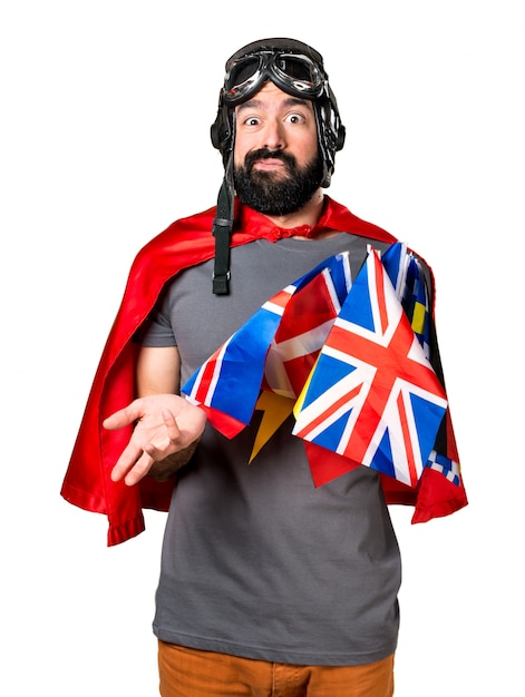 Surprised Superhero Surrounded by Flags – Free Download