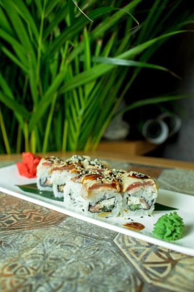 Traditional Japanese Cuisine Sushi Roll with Eel, Avocado, and Cream Cheese â Free Stock Photo for Download